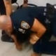 Video footage captured from bystanders’ cellphones appears to show one officer applying a choke hold to Ronald Johns.
YouTube screenshot